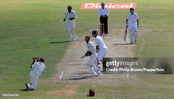 England batsman Alastair Cook is caught by West Indies fielder Devon Smith off the bowling of Chris Gayle during the 3rd Test match between West...
