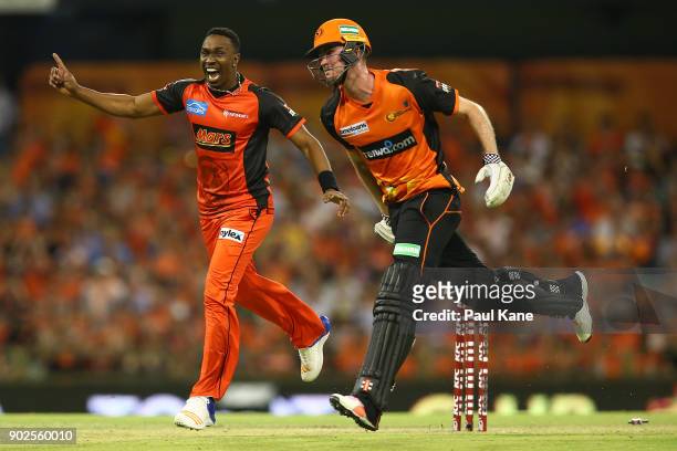 Dwayne Bravo of the Renegades celebrates running out Ashton Turner of the Scorchers during the Big Bash League match between the Perth Scorchers and...