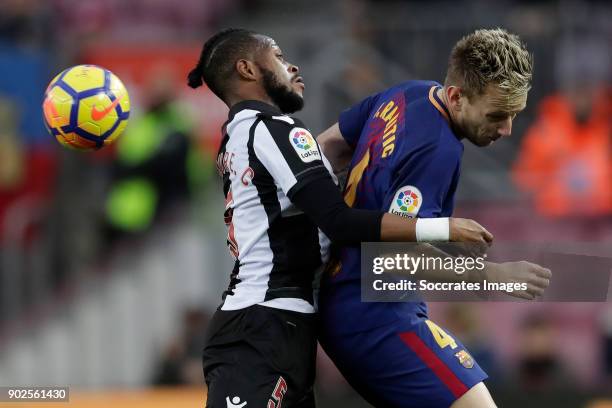 Cheick Doukoure of Levante, Ivan Rakitic of FC Barcelona during the La Liga Santander match between FC Barcelona v Levante at the Camp Nou on January...