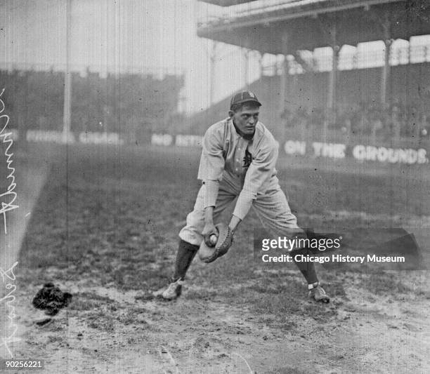 American baseball player Charles Schmidt , of Detroit Tigers, fields the ball during a game against the Chicago White Sox at South Side Park,...