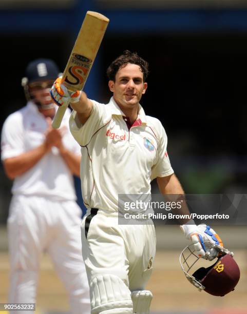 West Indies batsman Brendan Nash celebrates reaching 100 runs during his innings of 109 in the 5th Test match between West Indies and England at...