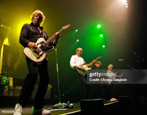 Rick Parfitt and Francis Rossi of Status Quo perform on stage at Hallenstadion on August 22, 2009 in Zurich, Switzerland.