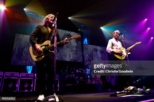Rick Parfitt and Francis Rossi of Status Quo perform on stage at Hallenstadion on August 22, 2009 in Zurich, Switzerland.