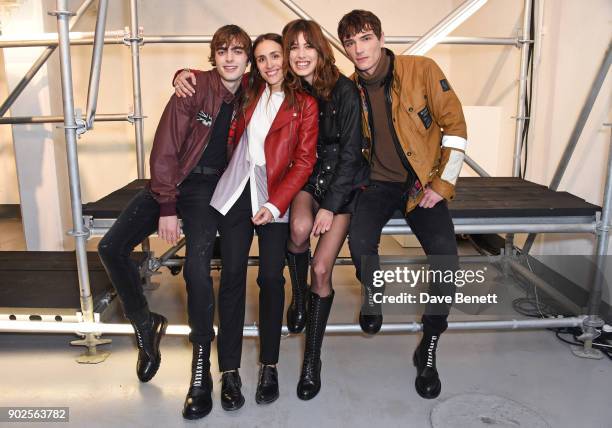 Delphine Ninous , Belstaff Creative Director, poses with models Lennon Gallagher, Lorelle Rayner and Julien Sabaud at the Belstaff presentation...