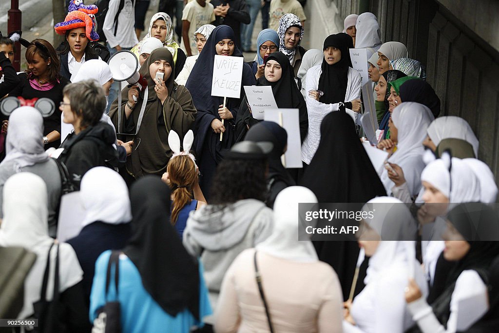 Veiled women protest against the ban of