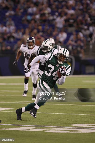 Cornerback Marquice Cole of the New York Jets has an interception against the Baltimore Ravens in a preseason game at M&T Bank Stadium on August 24,...