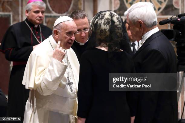 Pope Francis greets Us ambassador to the Holy See Callista Gingrich and her husband Newt Gingrich during the State Of The World Address to accredited...