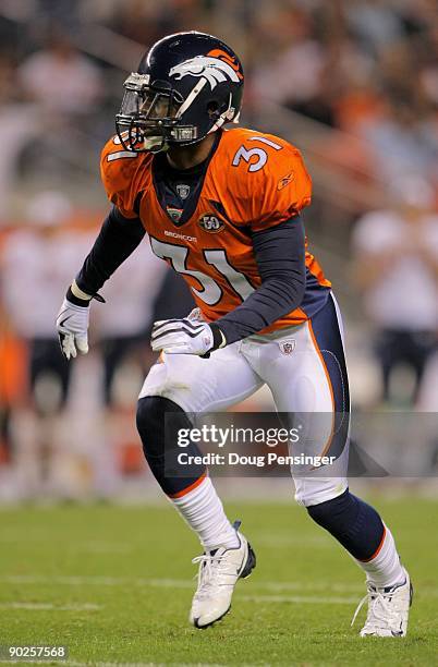 Safety Darcel McBath of the Denver Broncos defends against the Chicago Bears during preseason NFL action at INVESCO Field at Mile High on August 30,...