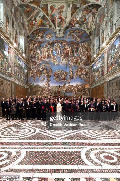 Pope Francis poses with accredited ambassadors to the Holy See at the Sistine Chapel 'Cappella Sistina' on January 8, 2018 in Vatican City, Vatican.