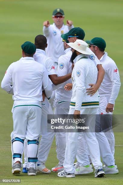 Vernon Philander of South Africa and team mates celebrate the wicket of Virat Kohli of India during day 4 of the 1st Sunfoil Test match between South...