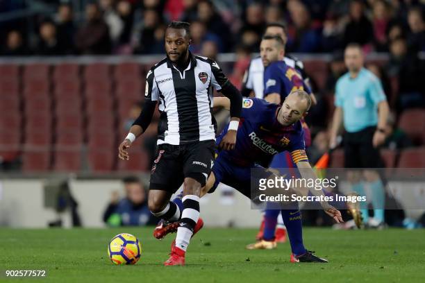 Cheick Doukoure of Levante, Andries Iniesta of FC Barcelona during the La Liga Santander match between FC Barcelona v Levante at the Camp Nou on...