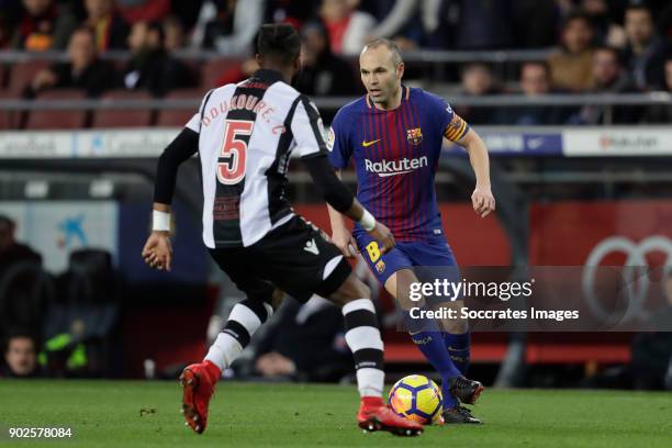 Cheick Doukoure of Levante, Andries Iniesta of FC Barcelona during the La Liga Santander match between FC Barcelona v Levante at the Camp Nou on...