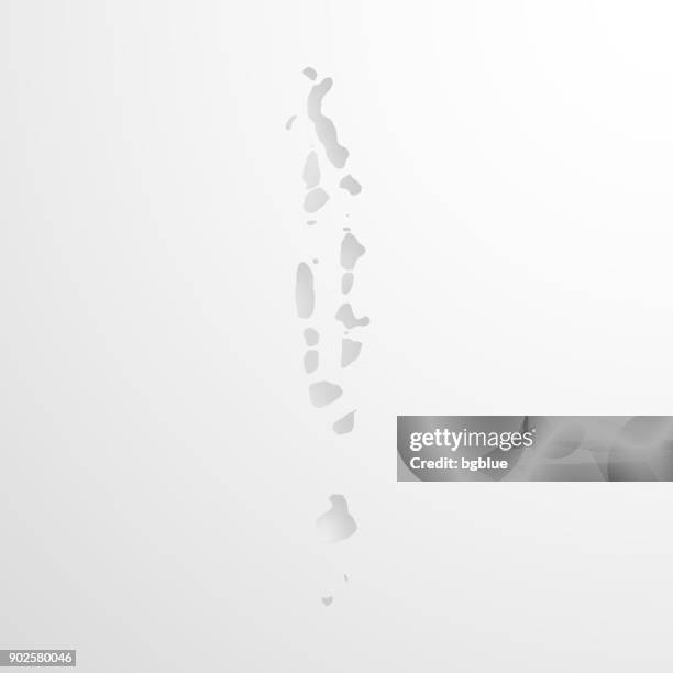 maldives map with embossed paper effect on blank background - male maldives stock illustrations