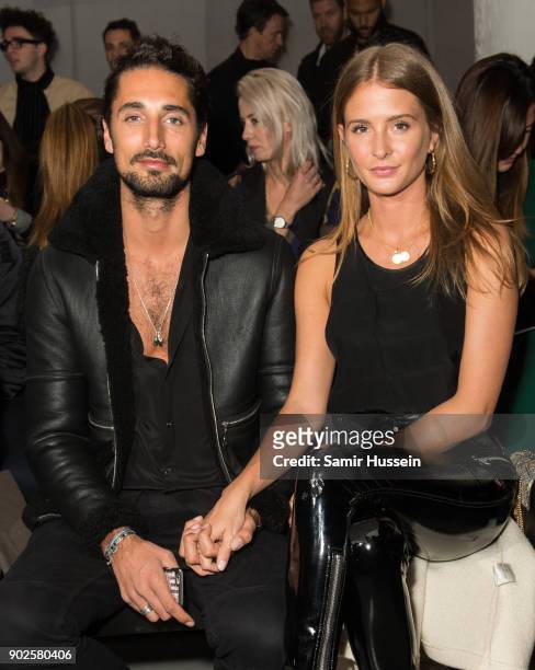 Hugo Taylor and Millie Mackinstosh attend the Blood Brothers show during London Fashion Week Men's January 2018 at on January 8, 2018 in London,...
