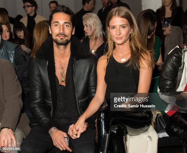Hugo Taylor and Millie Mackinstosh attend the Blood Brothers show during London Fashion Week Men's January 2018 at on January 8, 2018 in London,...