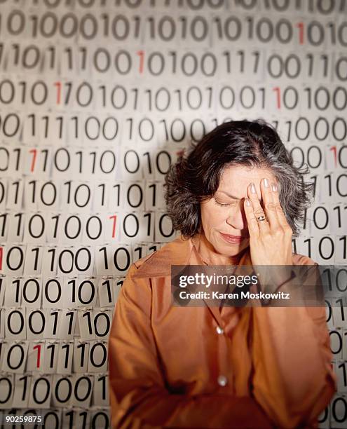 upset woman with binary code - binary code face stock pictures, royalty-free photos & images