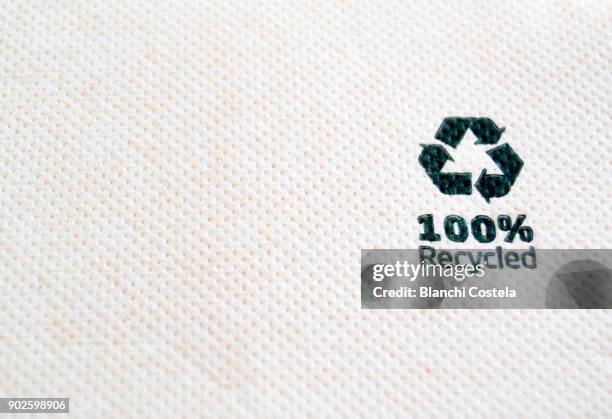 100 percent recycled mark on a sheet - 100 percent recycled stock pictures, royalty-free photos & images