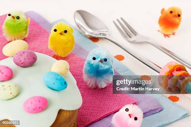 easter cupcake and multicolored chick decorations - chicken decoration stock-fotos und bilder