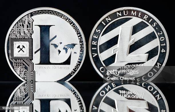 In this photo illustration, a visual representation of the digital Cryptocurrency, Litecoin is displayed on January 08, 2018 in Paris, France....