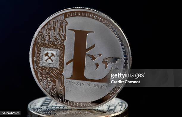 In this photo illustration, a visual representation of the digital Cryptocurrency, Litecoin is displayed on January 08, 2018 in Paris, France....