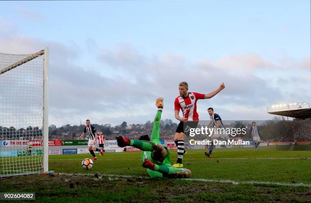 Ben Foster of West Bromwich Albion saves a shot from Jayden Stockley of Exeter City during The Emirates FA Cup Third Round match between Exeter City...