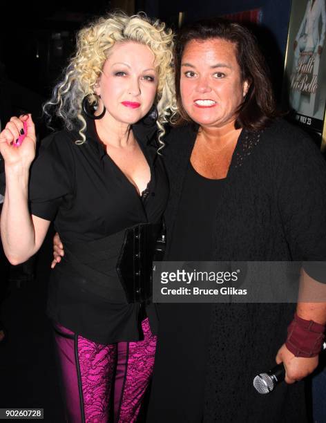 Cyndi Lauper and Rosie O'Donnell pose backstage at the "Girls Night Out" tour at the Capital One Bank Theatre on August 8, 2009 in Westbury, New York.