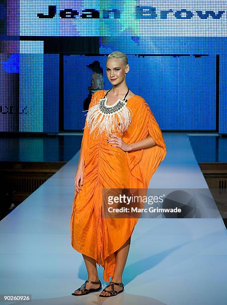 Model showcases designs by Jean Brown on the catwalk at the V Australia Group Show as part of Mercedes-Benz Fashion Festival Brisbane 2009 at...