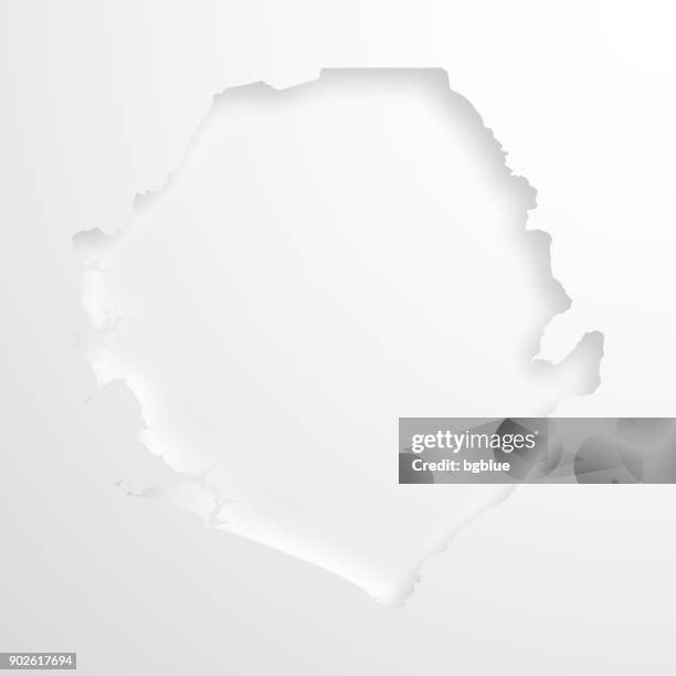 sierra leone map with embossed paper effect on blank background - sierra leone stock illustrations
