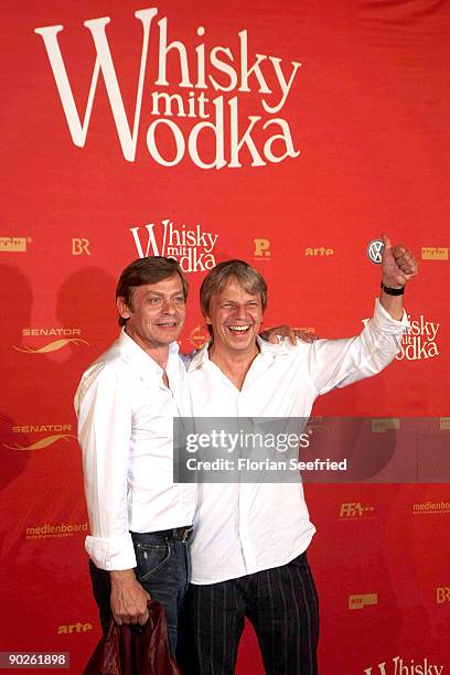 Actor Sylvester Groth and diretor Andreas Dresen attend the premiere of 'Whisky mit Wodka' at cinema International on September 1, 2009 in Berlin,...