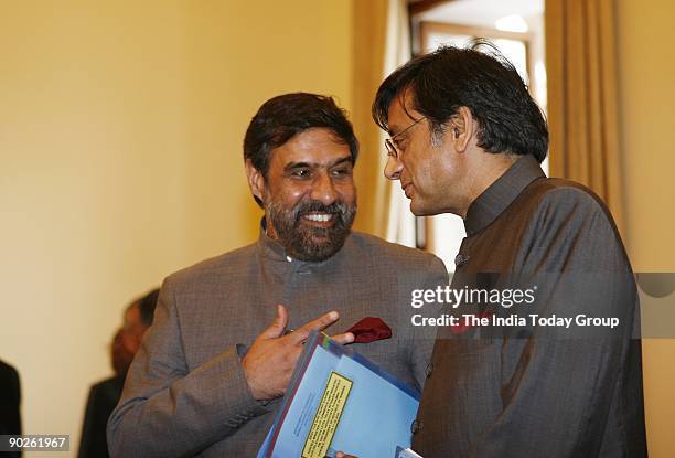 Industry and Commerce Minister Anand Sharma and MoS for External Affairs Shashi Tharoor on the occasion of signing of agreements between India and...