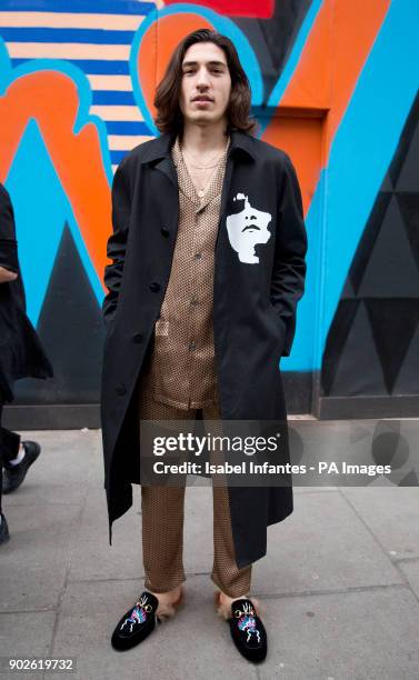 Spanish professional footballer Hector Bellerin wears Christopher Shannon jacket, Zimmermann pyjamas and Gucci shoes during the Autumn/ Winter 2018...