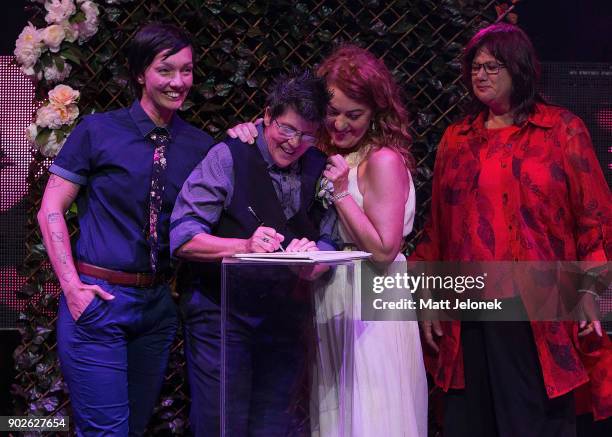 Gillian Brady and Lisa Goldsmith sign their marriage certificate at The Court on January 9, 2018 in Perth, Australia. Couples across Australia wed in...