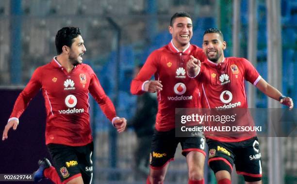 Egypts al-Ahly player Momen Zakaria celebrates with his teammates after scoring a goal during the Egyptian Premier League football match between...