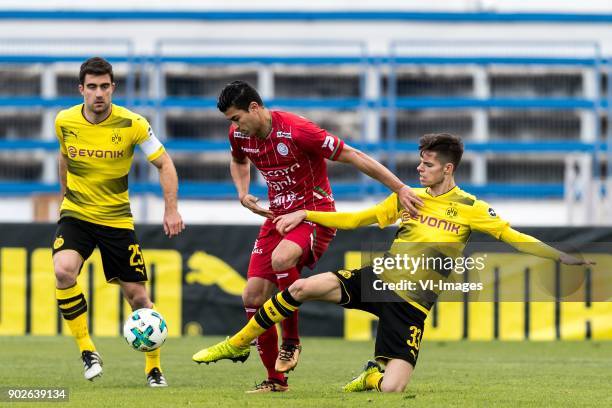 Sokratis Papastathopoulos of Borussia Dortmund, Hamdi Harbaoui of SV Zulte Waregem, Julian Weigl of Borussia Dortmund during the friendly match...