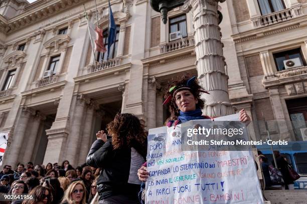 Primary School teachers protest outside the Ministry of Education during a strike on January 8, 2018 in Rome, Italy. The teachers are protesting...