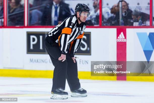 Referee Kelly Sutherland waits for a face-off during second period National Hockey League action between the Tampa Bay Lightning and Ottawa Senators...