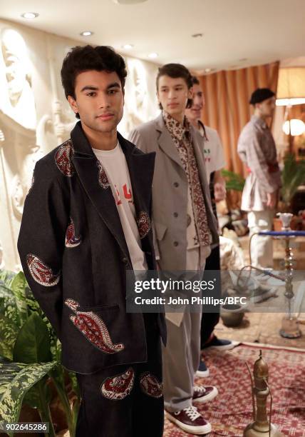 Models showcase designs at the Paria Farzaneh presentation during London Fashion Week Men's January 2018 at on January 8, 2018 in London, England.