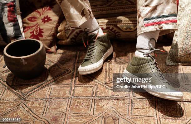 Model showcases a design at the Paria Farzaneh presentation during London Fashion Week Men's January 2018 at on January 8, 2018 in London, England.