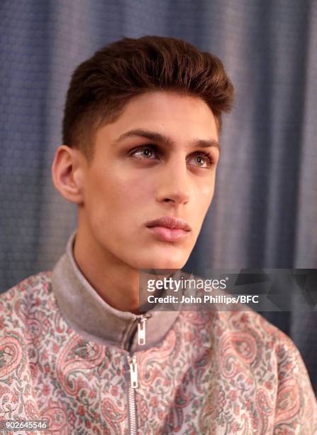 Model showcases a design at the Paria Farzaneh presentation during London Fashion Week Men's January 2018 at on January 8, 2018 in London, England.