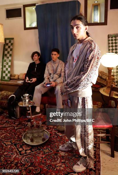 Models showcase designs at the Paria Farzaneh presentation during London Fashion Week Men's January 2018 at on January 8, 2018 in London, England.