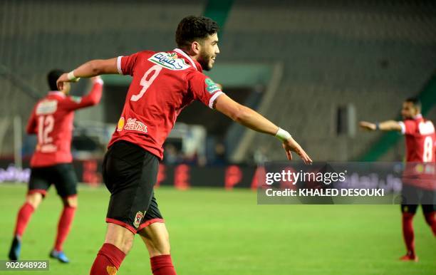 Egypts al-Ahly player Walid Azaro celebrates with his temmates after scoring a goal during the Egyptian Premier League football match between Al-Ahly...
