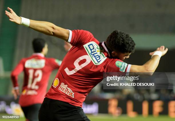 Egypts al-Ahly player Walid Azaro celebrates with his temmates after scoring a goal during the Egyptian Premier League football match between Al-Ahly...