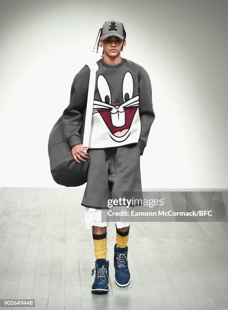 Model walks the runway at the Bobby Abley show during London Fashion Week Men's January 2018 at BFC Show Space on January 8, 2018 in London, England.