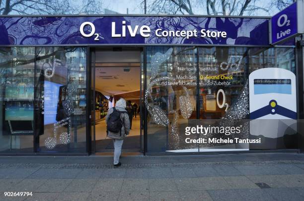 Person enters an O2 Mobile phone company Store on January 8, 2018 in Berlin, Germany. According to government statisticians, nominal revenue grew...