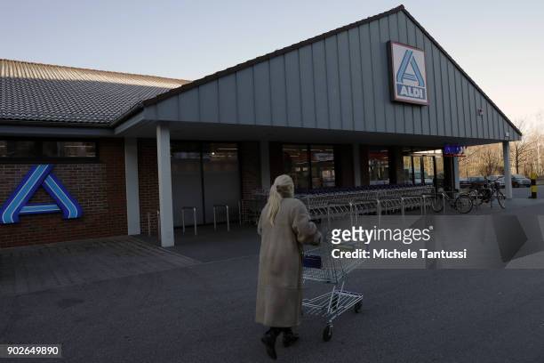 Customer enters an ALDI Discount supermarket on January 8, 2018 in Berlin, Germany. According to government statisticians, nominal revenue grew...