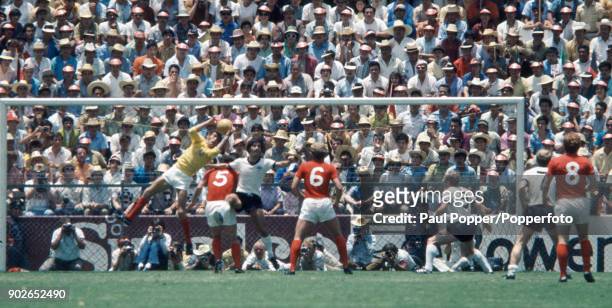 England goalkeeper Peter Bonetti catches the ball under pressure from German striker Gerd Muller during the FIFA World Cup quarter final match...
