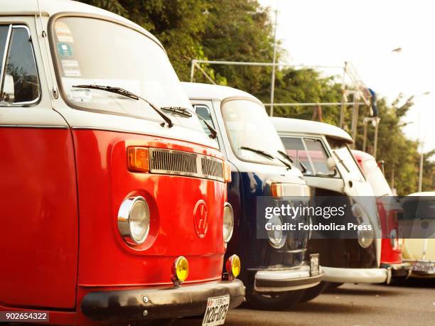 Side view of a group of four Volkswagen T1 & T2 Brazilian Kombi.