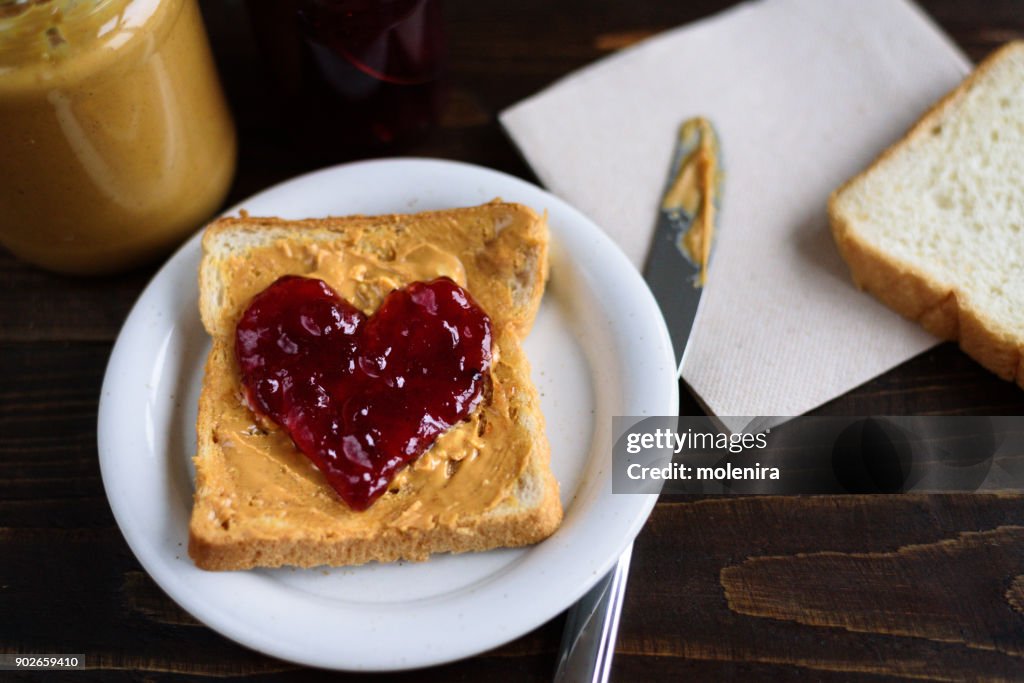 Peanut butter and heart shaped jelly sandwich