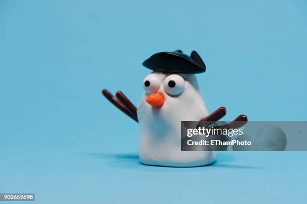 melting play dough snowman - deflating stock pictures, royalty-free photos & images