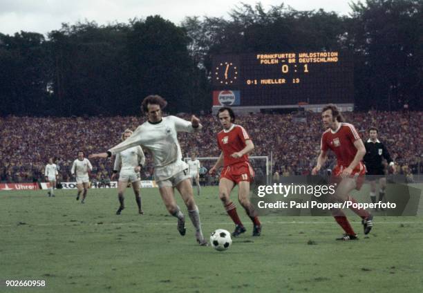 Wolgang Overath of West Germany moves into the Polish penalty area during the FIFA World Cup match between Poland and West Germany at the Waldstadion...